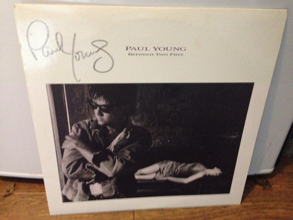 Paul Young - Between Two Fires -  Autographed Copy - 1986- pop rock (vinyl)