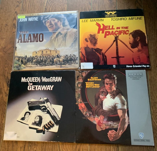 LaserDiscs- Lot # 36 - John Wayne, Steve McQueen, Lee Marvin , Clint east Wood (sold as a lot)